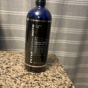 Peter Thomas Roth Retinol Fusion PM Night Serum in Black and Blue 6.7oz